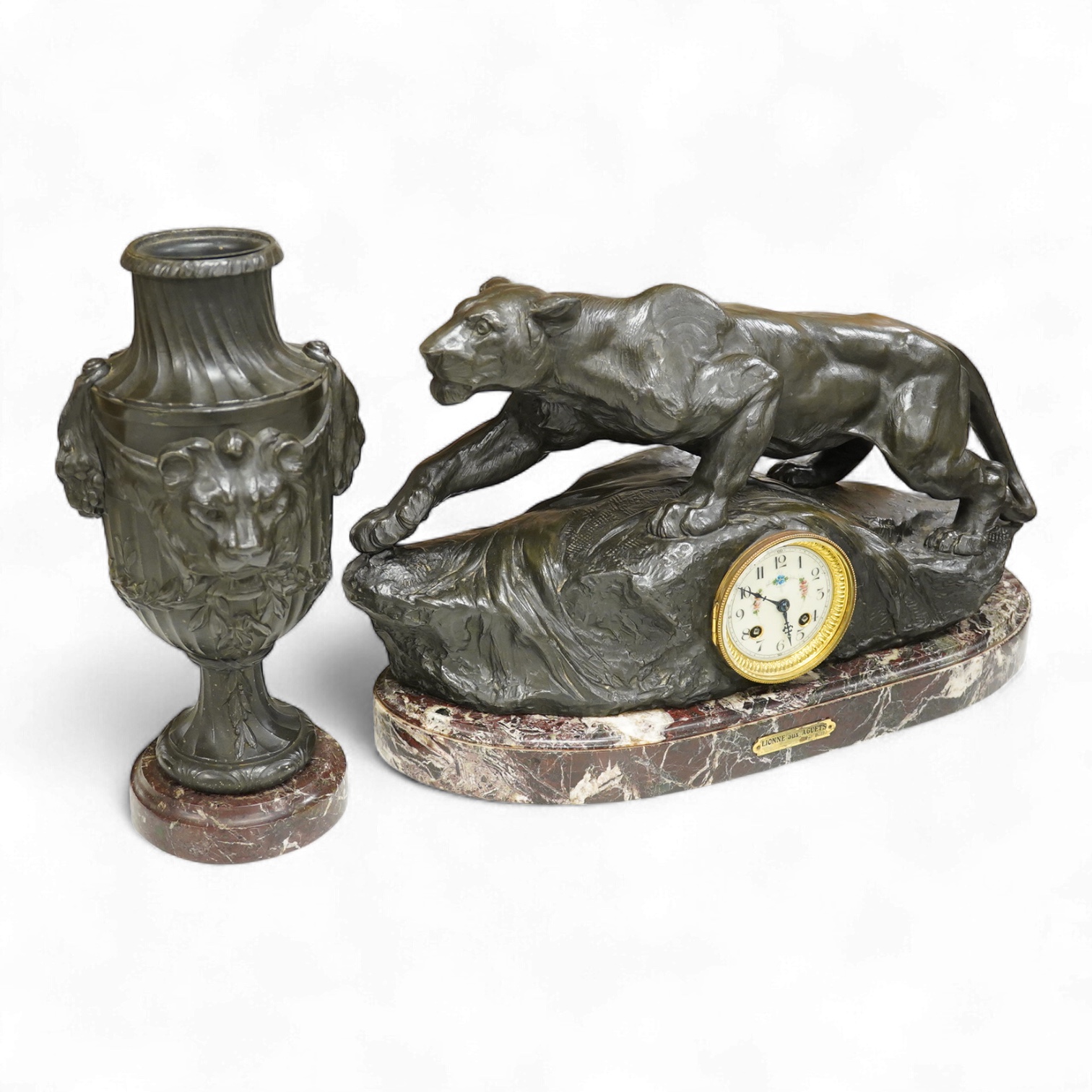 A clock garniture signed Boffil, ‘Lionne aux Agnets’